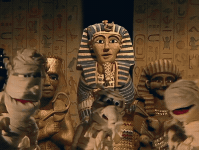 Mummy Puppets With Egyptian Writing GIF