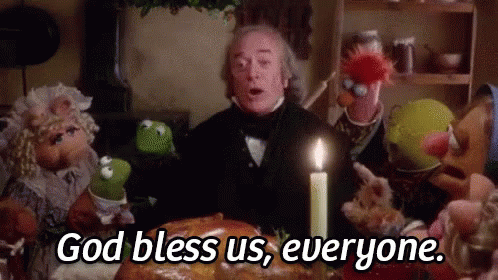 Muppets Sitting Around Table With Candle And Man Standing GIF