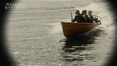Murdoch Mysteries Poster Boat With Two Men GIF