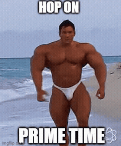 Muscular Man In Bikini Standing On Beach GIF