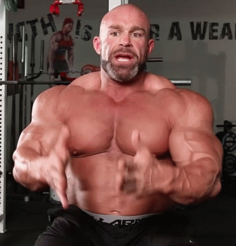 Muscular Man Standing Before Faith Is Weak Sign GIF