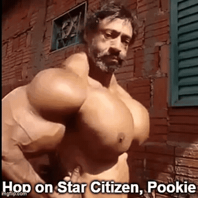 Muscular Man With Beard By Brick Wall GIF