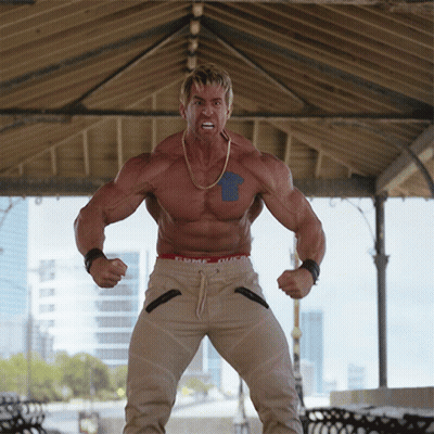 Muscular Man With Blue Arrow In Front Of Gazebo GIF