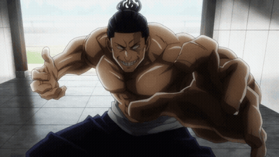 Muscular Man With Bun Giving Thumbs Up GIF