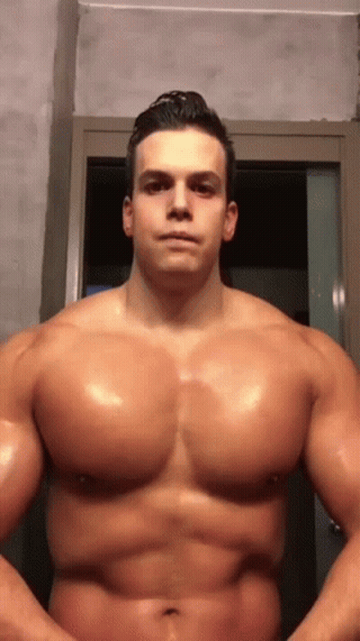 Muscular Man Without Shirt In Mirror GIF