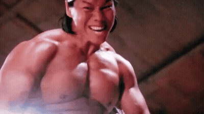 Muscular Shirtless Man Smiling At Camera GIF