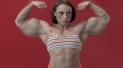 Muscular Woman In Striped Top Flexing Against Red Background GIF
