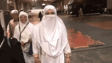 Muslim Woman Waving