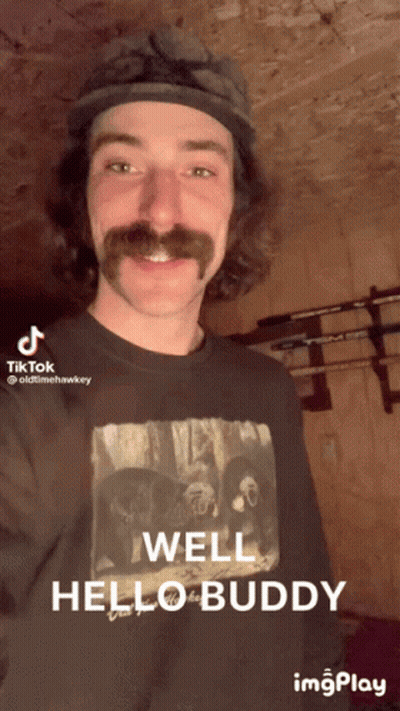 Mustached Man Black Shirt Saying Well Hello Buddy GIF