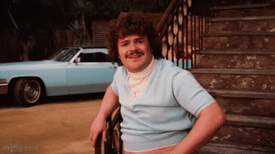 Mustached Man Leaning On Railing By Car GIF