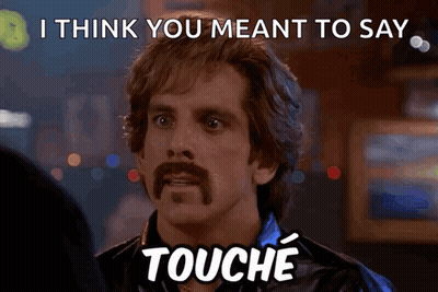 Mustached Man Saying I Think You Meant To Say Touche GIF