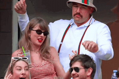 Mustached Man Thumbs Up Woman In Sunglasses GIF