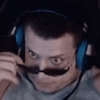 Mustached Man With Headphones and Sunglasses Making Funny Face