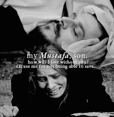 Mustafa Abi Nasi Behind Table GIF