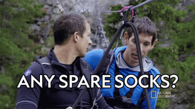 National Geographic Ad Two Men Talking Any Spare Socks GIF
