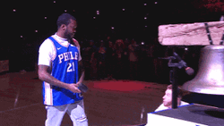 NBA Play Off Fan Striking Bell GIF
