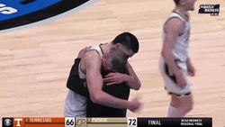 NBA Player Zach Edey Hugging Coach GIF