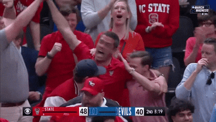 Nc State Fan Group Hug Each Other GIF