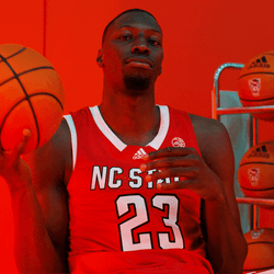 Nc State Guy Sitting Playing With Ball GIF