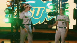 Ndsu Softball Players Shoulder Bump GIF