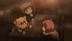 Neco Arc With Other Cats In A Table GIF
