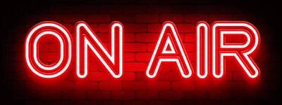 Neon ON AIR Sign On Red Brick Wall GIF
