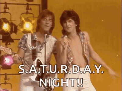 Neon Sign Saying It's Saturday Night GIF