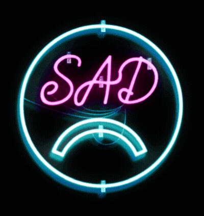 Neon Sign Saying Sad With Sad Face GIF