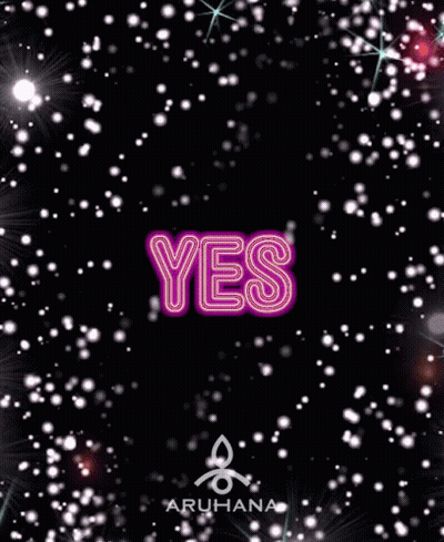 Neon Sign Saying Yes With Snowflakes GIF