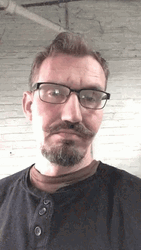 Nerd Bearded Guy Eye Brow Raise GIF