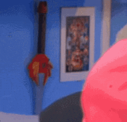 Nerd Sneaking From Behind Sinister Smile GIF
