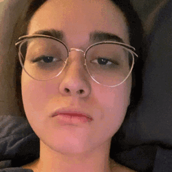 Nerdy Becca Spit To Camera GIF