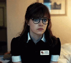 Nerdy Emma Stone Looking Around GIF
