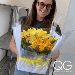Nerdy Girl Giving Flowers GIF