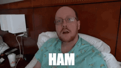 Nerdy Guy Shouting Ham GIF