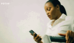 Nervous Woman Secretly Sneaking On Phone GIF