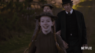 Netflix Ad Girl With Red Hair And Braids GIF