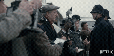 Netflix Ad Group Of Men Taking Notes GIF