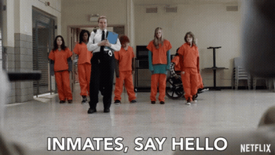 Netflix Ad Inmates Walking In Hallway GIF