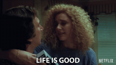 Netflix Ad Man And Woman Hugging Life Is Good GIF