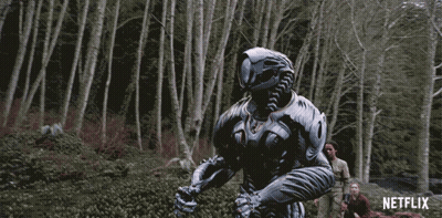 Netflix Ad Man In Futuristic Suit In Forest GIF