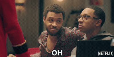 Netflix Ad Two Men Looking At Laptop GIF