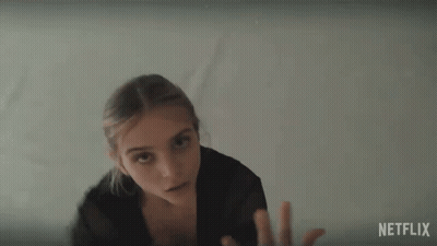 Netflix Ad Woman In Black Top GIF