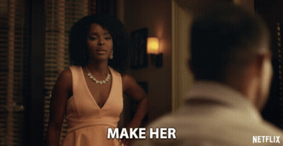 Netflix Ad Woman In Pink Dress Looking At Man GIF