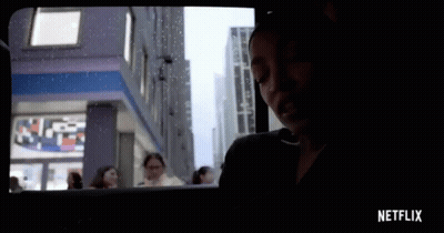 Netflix Ad Woman Looking Out Window GIF
