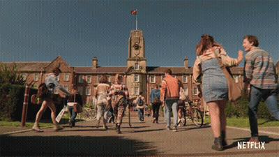 Netflix Brick Building People Walking GIF