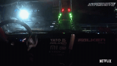 Netflix Hyperdrive Car Driving Over Bridge GIF