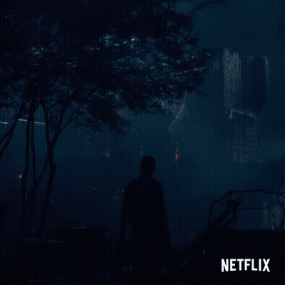 Netflix Man Walking Through Dark Forest GIF