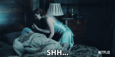 Netflix Woman Covering Person's Head With Blanket GIF