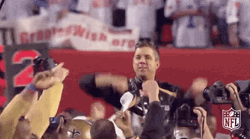 New Orleans Saints Head Coach Sean Payton Proudly Raising Both Hands For Winning GIF